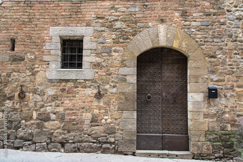 Door and window in ancient brick wall Door and window in ancient brick wall