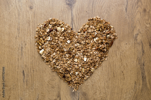 Heart made of fresh dried granola © lukaspuchrik