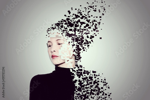 A close up portrait of an oriental woman with pixelated dispersion  photo