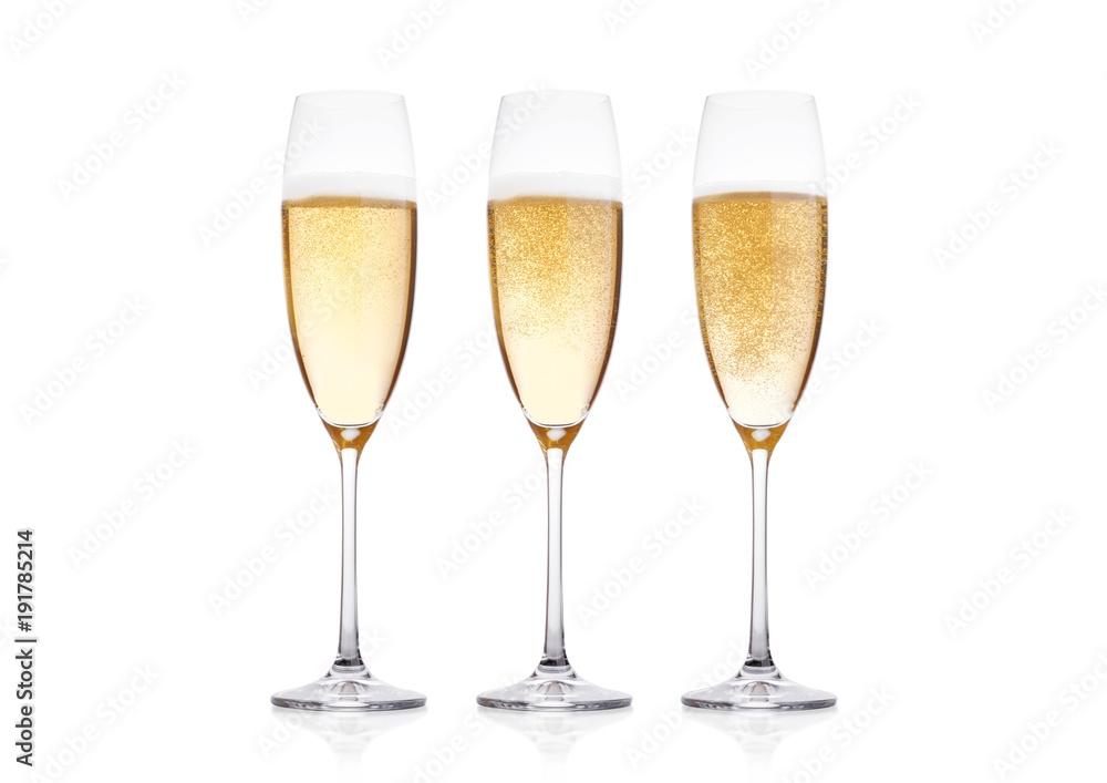 Elegant glasses of yellow champagne with bubbles