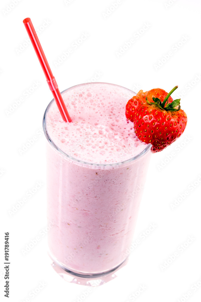 Glass of strawberry milkshake with fruits Glass of strawberry milkshake with fruits