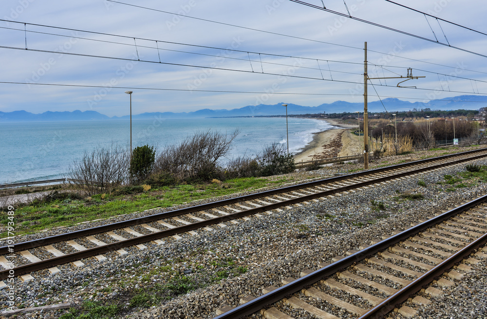 Railway with beach at the bottom