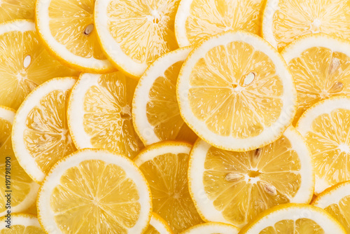 Background made from sliced lemon citrus fruits.