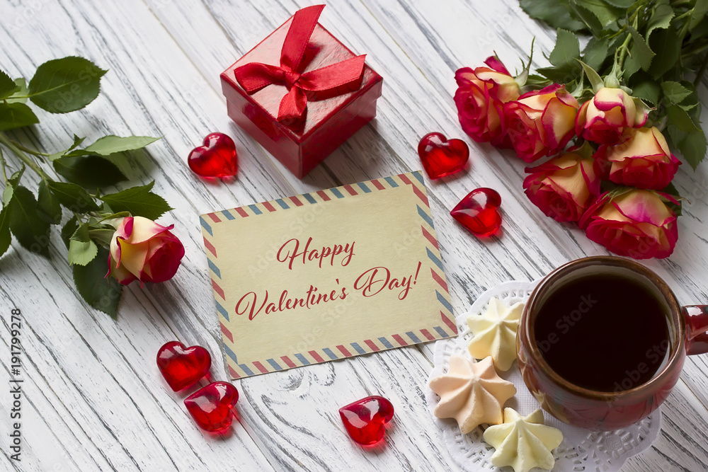 Naklejka premium Valentines day greeting card with roses red gift box and lettering.