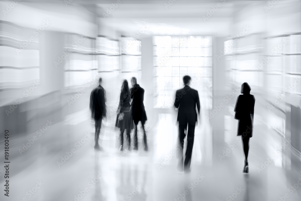 group of people in the lobby business center  in monochrome blue tonality