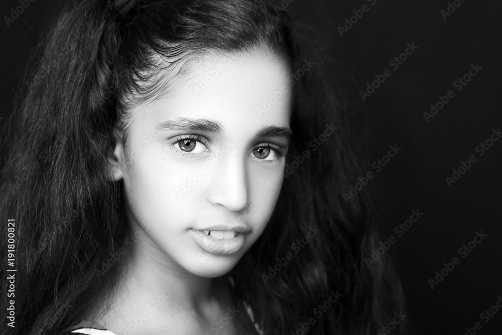 Pretty girl and looking at the camera Pretty girl and looking at the camera