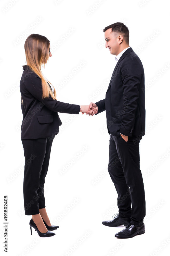 Smiling business partners shaking hands against a white background Smiling business partners shaking hands against a white background