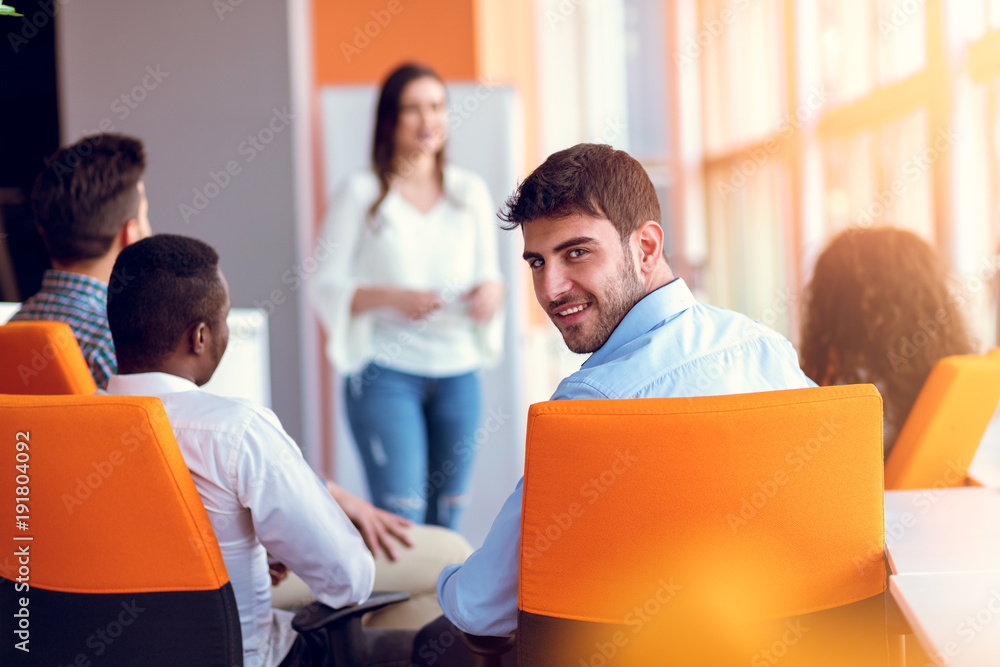 Group of casually dressed businesspeople discussing ideas in the office. Group of casually dressed businesspeople discussing ideas in the office.