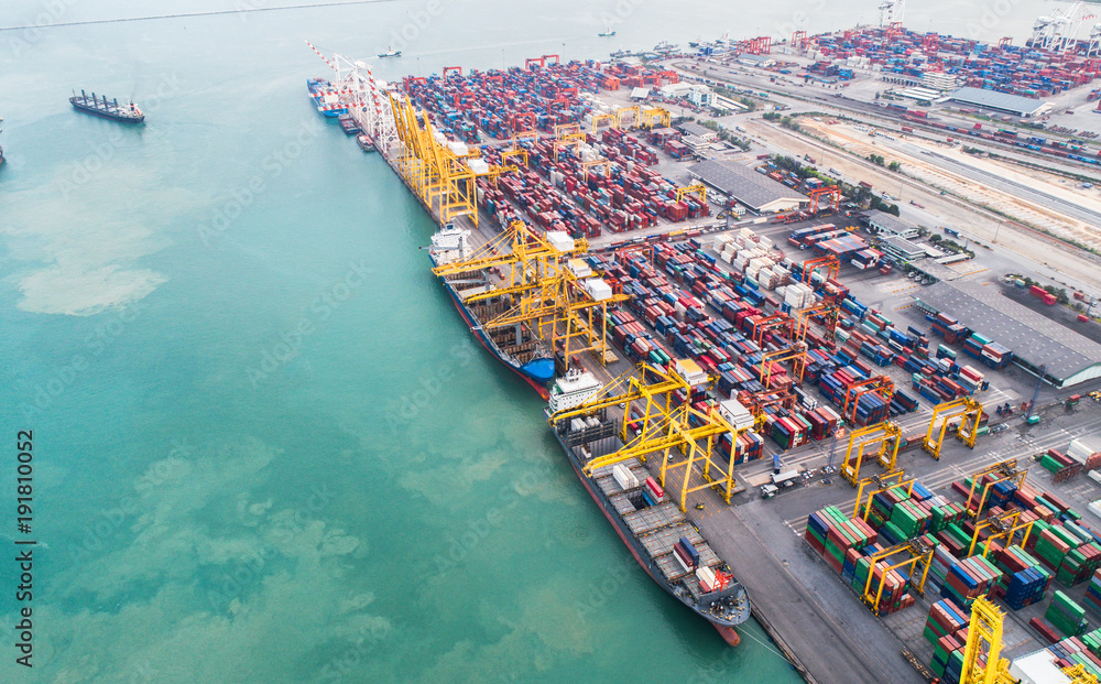 aerial view of international port service for transmission cargo containers transport to worldwide logistics system