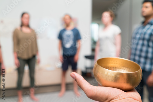 Corporate wellness workshop metitation singing bell