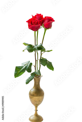 Red rose in brass vase on the table vintage style on white background.