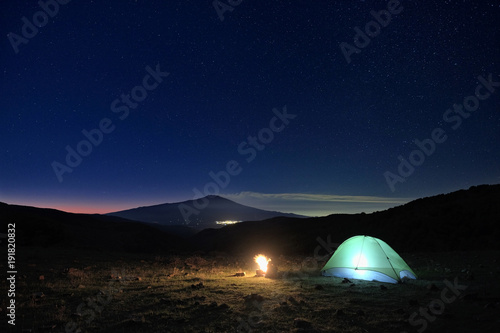 Wild Camp And Etna Volcano Under The Starry Sky At Dawn, Sicily
