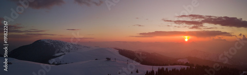Wonderful drone aerial sunset at the Monte Pora ski area in winter season. Orobie Alps