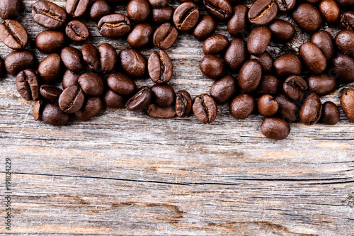 coffee beans on wooden ground