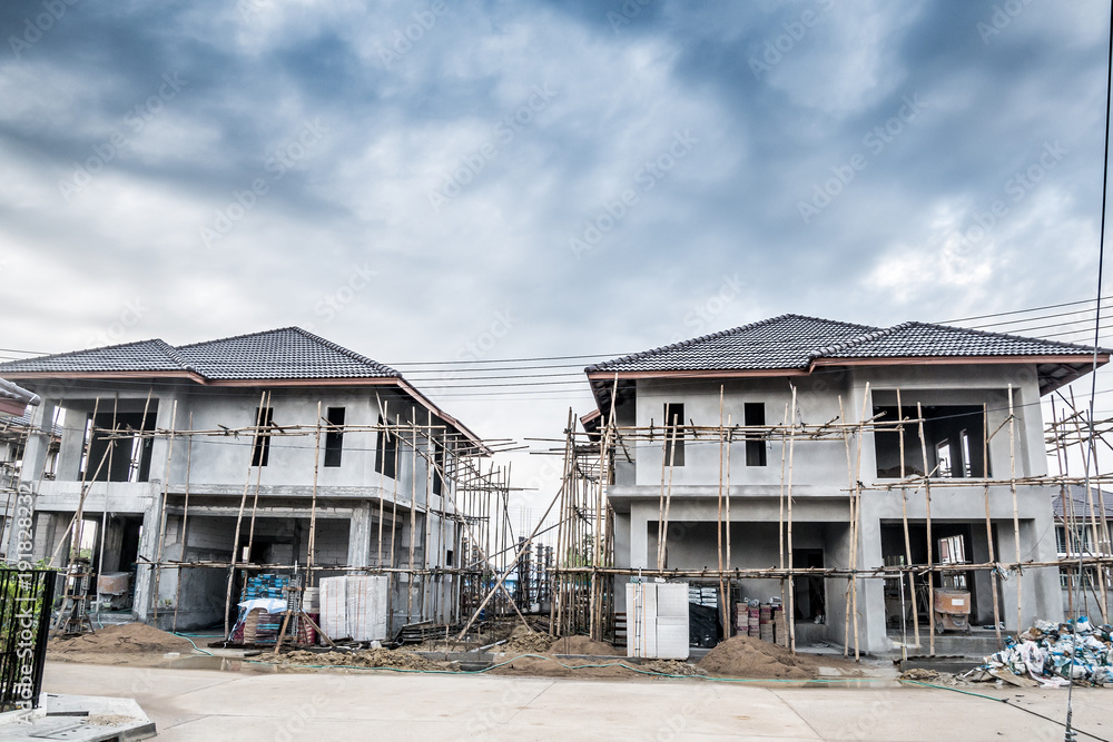 construction residential new house in progress at building site construction residential new house in progress at building site