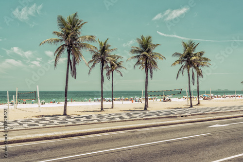 Sunny day with Palms on Ipanema Beach in Rio de Janeiro, Brazil