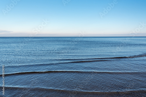 Fototapeta Still water in gulf of Riga, Baltic sea.