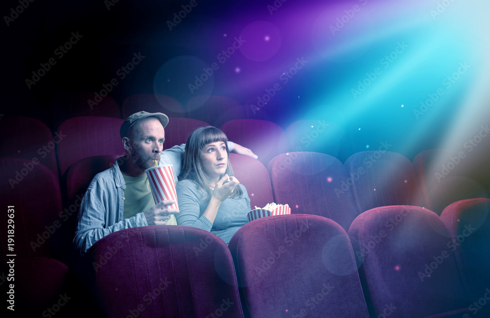 Naklejka premium Teenager couple watching movie