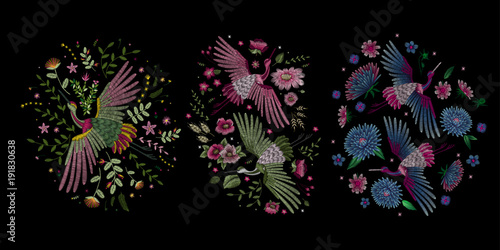 Crane bird  flowers  rose  rose-hip  plant. Traditional folk stylish stylish embroidery on the black background. Sketch for printing on clothing  fabric  bag  accessories and design. Vector  trend
