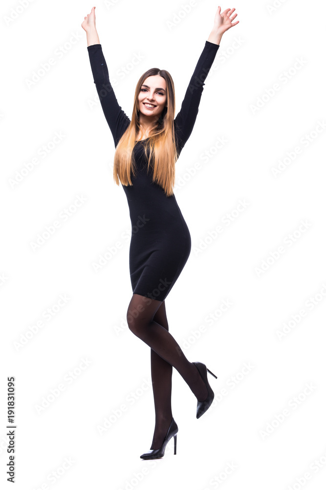 Happy pretty young woman in black dress smiling on white background. Celebrating success Happy pretty young woman in black dress smiling on white background. Celebrating success