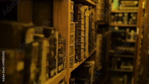 Bookshelves in old library with lots of books