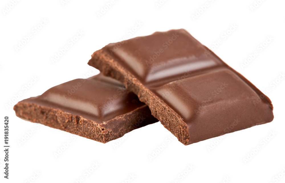 Milk chocolate pieces isolated on white background. Milk chocolate pieces isolated on white background.