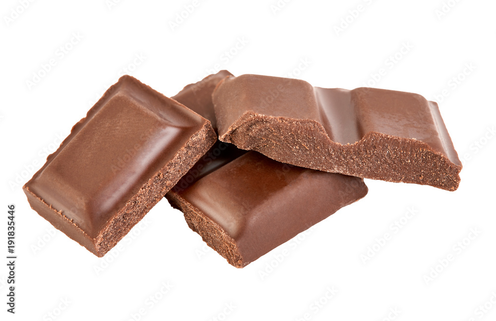 Milk chocolate pieces isolated on white background. Milk chocolate pieces isolated on white background.