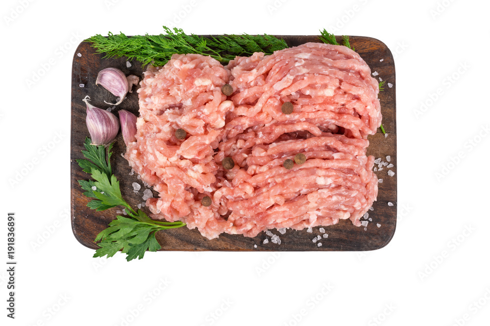 raw minced chicken meat on wooden cutting board isolated on white background raw minced chicken meat on wooden cutting board isolated on white background