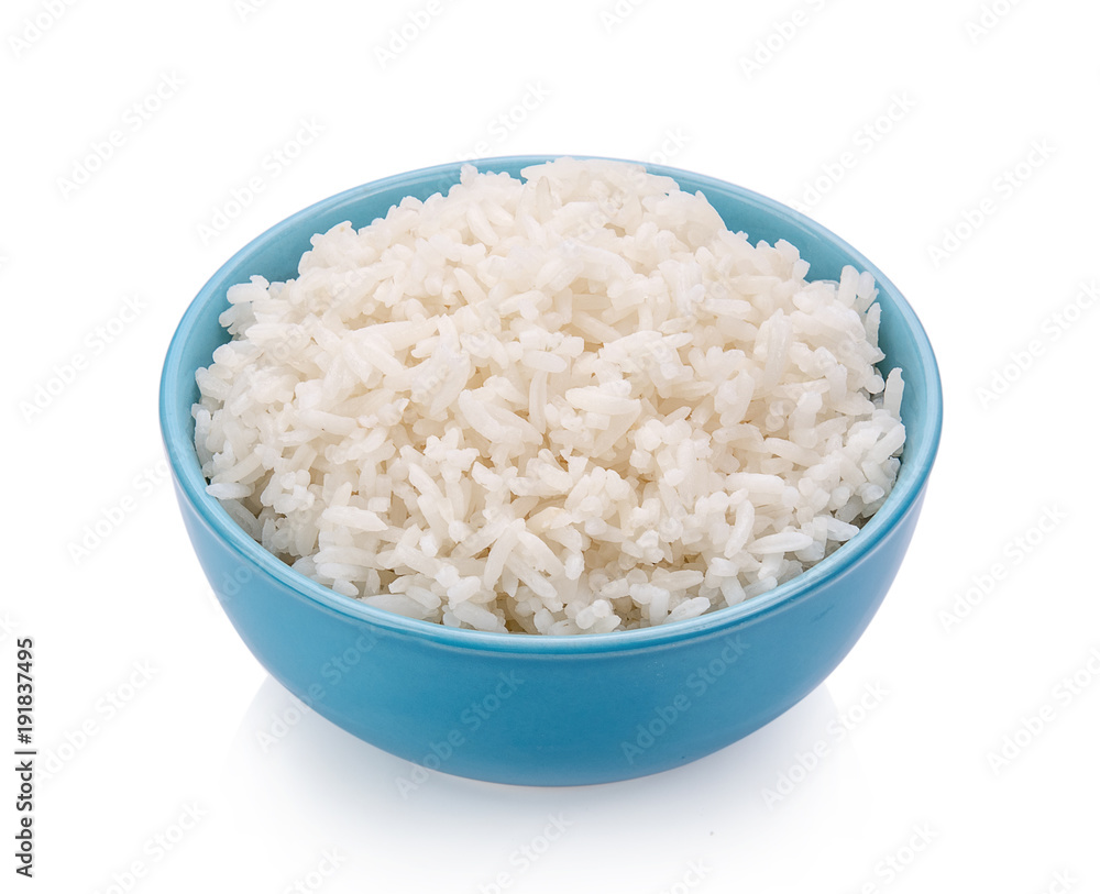 rice in blue bowl on white background rice in blue bowl on white background