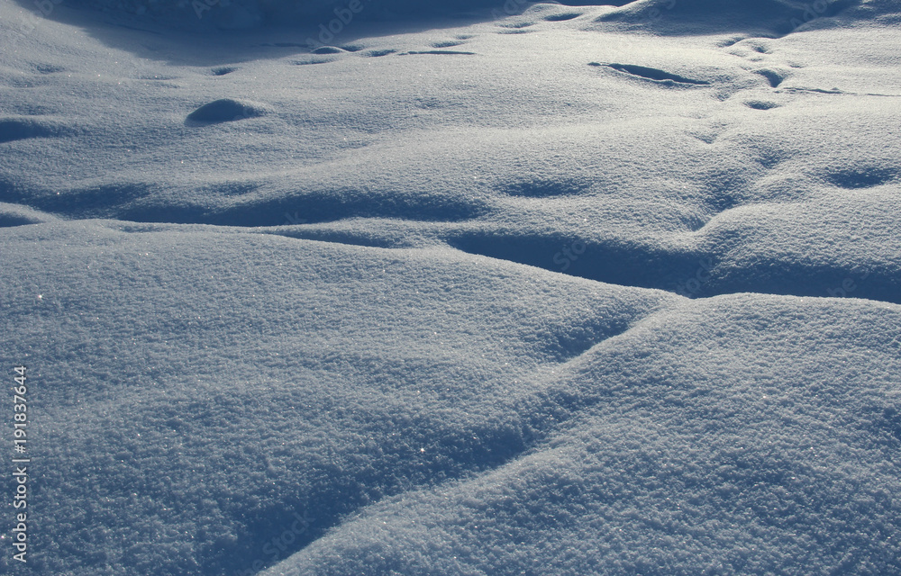 Background - snow, sunlight and shadows Background - snow, sunlight and shadows