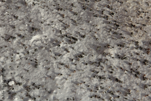 Fototapeta Naklejka Na Ścianę i Meble -  Background - Gravel on snowy pavement.