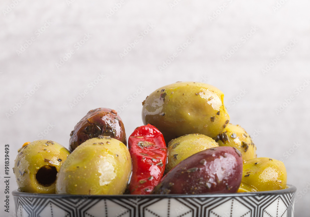 seasoned olives in a bowl close up