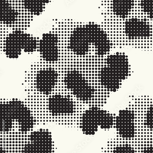 Seamless pattern ethnic style. Stylized animal skin imitation. Halftone textile print. Tribal fashion background. Black and white design.