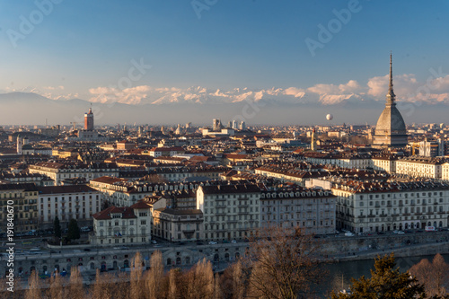 Italian City Landscape Of Torino With Alps And The Mole Antonelliana