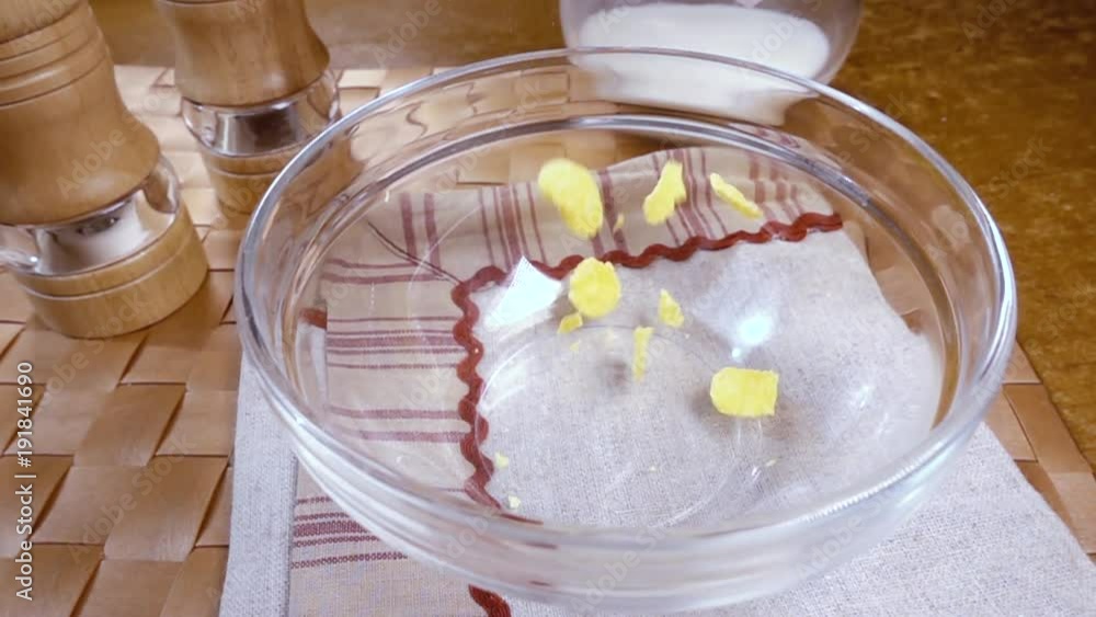 Crispy yellow corn flakes into the bowl for the morning a delicious Breakfast with milk. Slow motion with rotation tracking shot. Crispy yellow corn flakes into the bowl for the morning a delicious Breakfast with milk. Slow motion with rotation tracking shot.