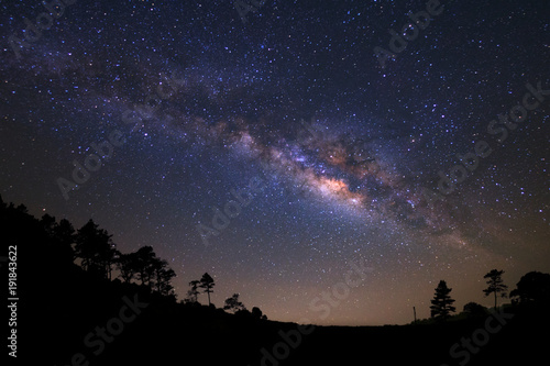 Landscape silhouette of tree with milky way galaxy and space dust in the universe, Night starry sky with stars