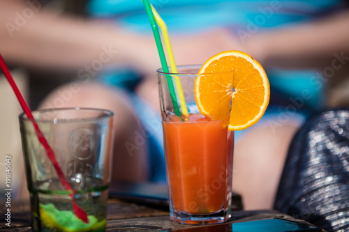 Alcohol orange daiquiri and mint cocktail