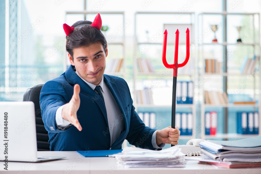 Fotografie Devil angry businessman in the office