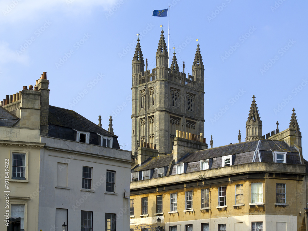 The tower of Bath Abbey rising above nearby buildings, City of Bath, UK