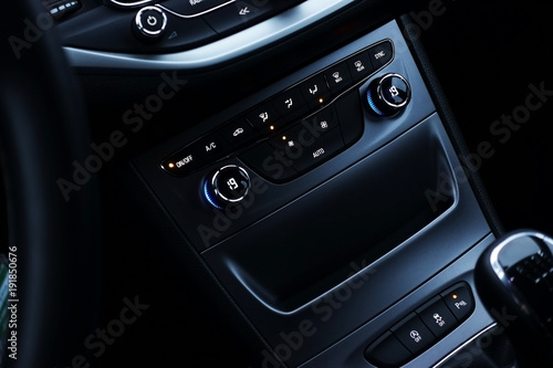 Modern car central console dashboard with futuristic design 