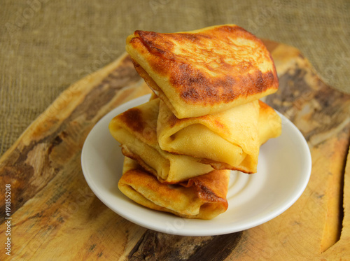 Foto Pancakes are put by the hill on a plate