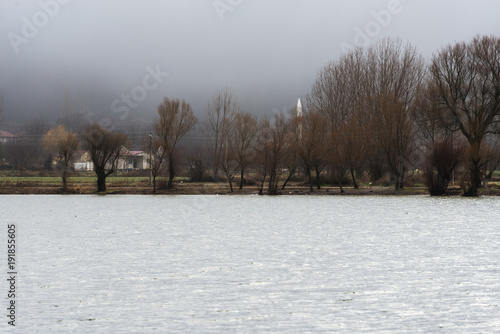 Foggy winter day at the Golcuk Lake, at Golcuk, Odemis, Izmir, Turkey