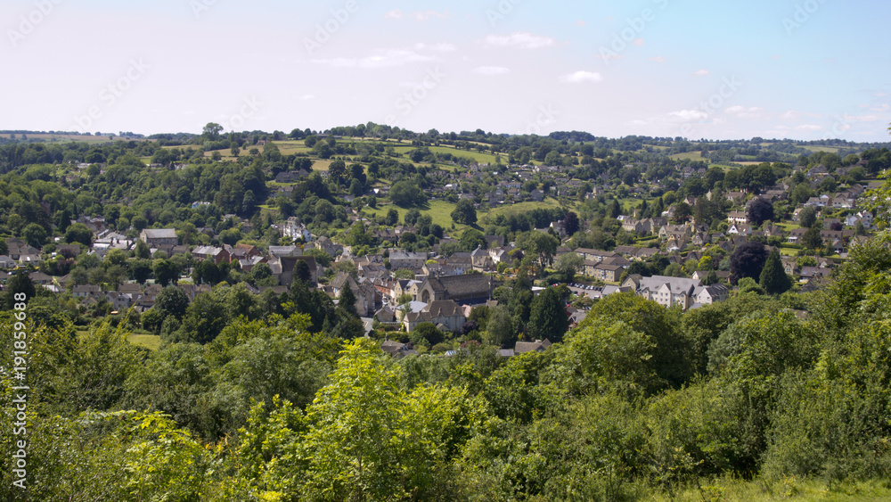 View over the town of Nailsworth in it's valleys on the edge of the Cotswold Hills, Gloucestershire, UK