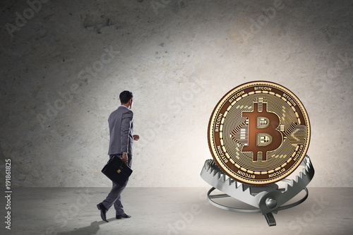 Businessman falling into the trap of bitcoin cryptocurrency