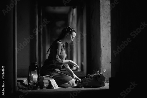 Retro girl in the old house reading books