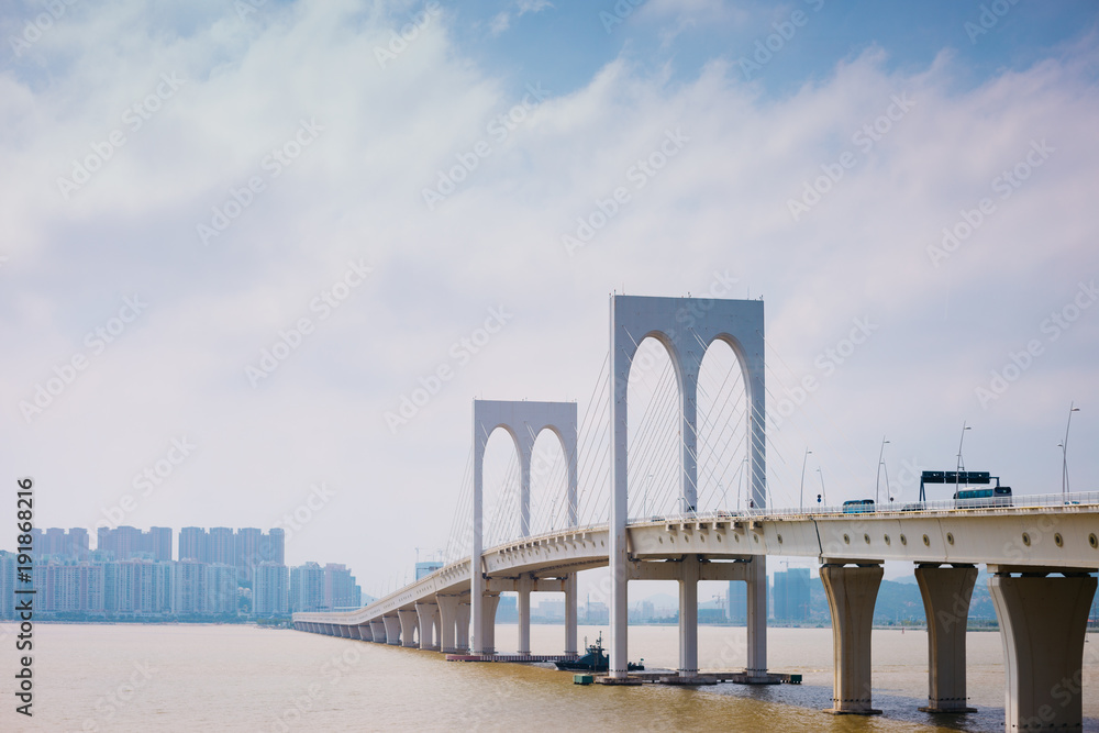 Sai Van bridge and modern buildings in Macau