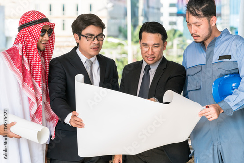 Engineer, businessmen and Arab man meeting photo