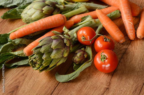 pile of vegetables on wooden table
