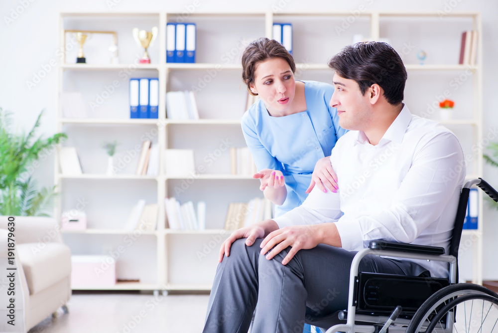 Fototapeta premium Disabled patient on wheelchair visiting doctor for regular check