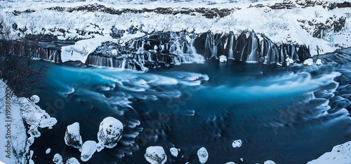 Hraunfossar waterfall in wi...